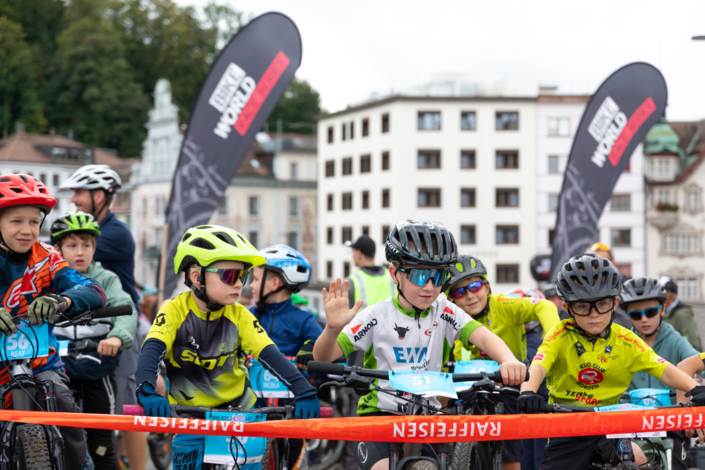 A group of children on bicycles.