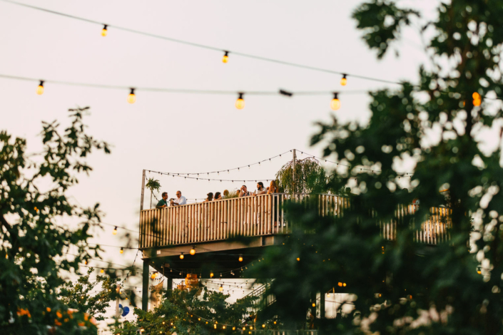 A group of people on a deck.