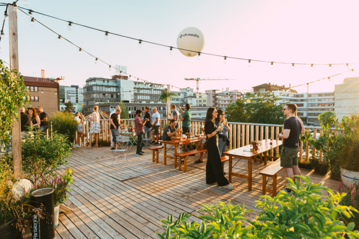 A group of people on a deck.